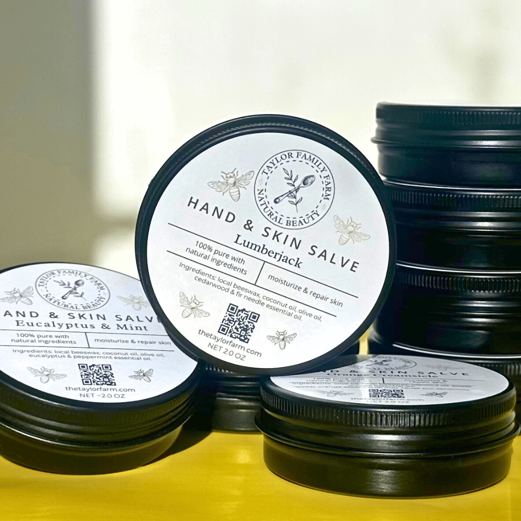 Taylor Family Farm hand and skin salve tins, including Lumberjack and Eucalyptus & Mint
