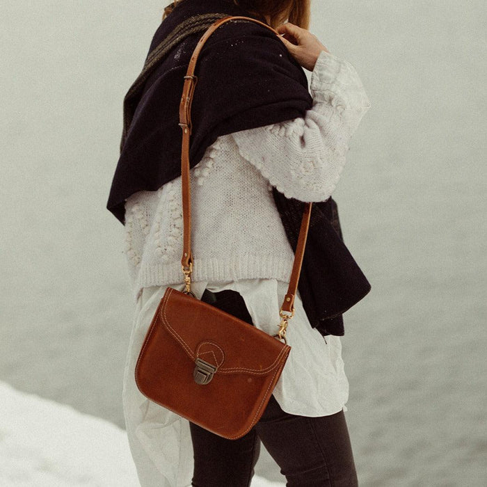 American-made leather shoulder bag with adjustable strap for everyday carry