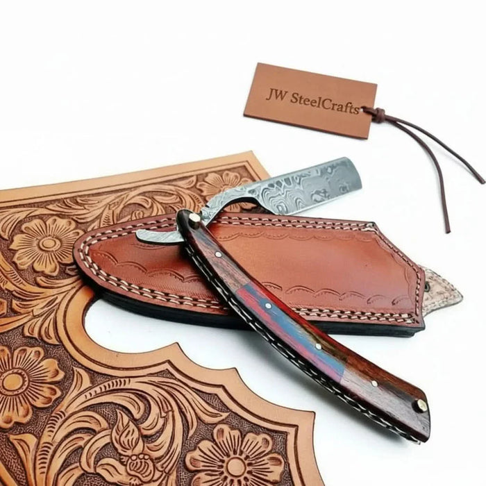 Folding straight barber razor with Damascus-pattern steel blade and multicolor wood handle