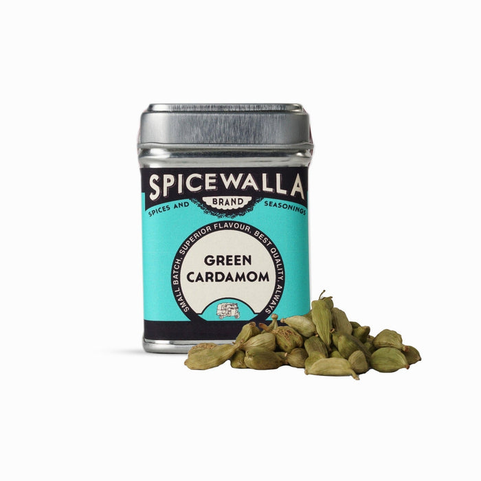 Whole green cardamom spices in retail packaging for cooking