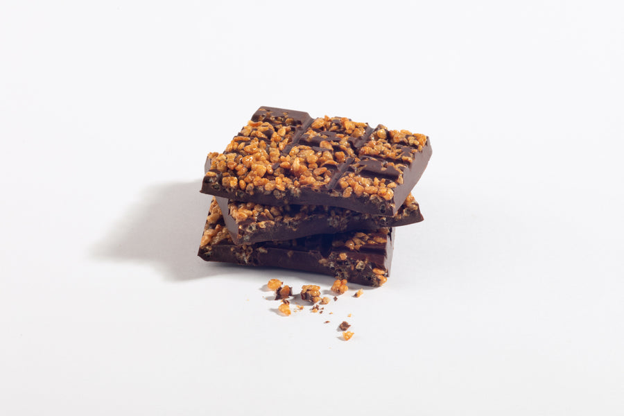 Stacked pieces of Dark Chocolate Caramelized Crisped Rice Bar