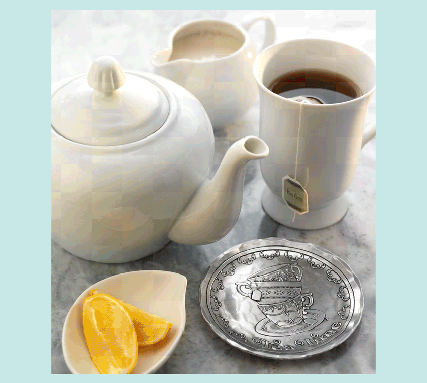 Styled display featuring Keep Warm and Drink Cocoa Coaster