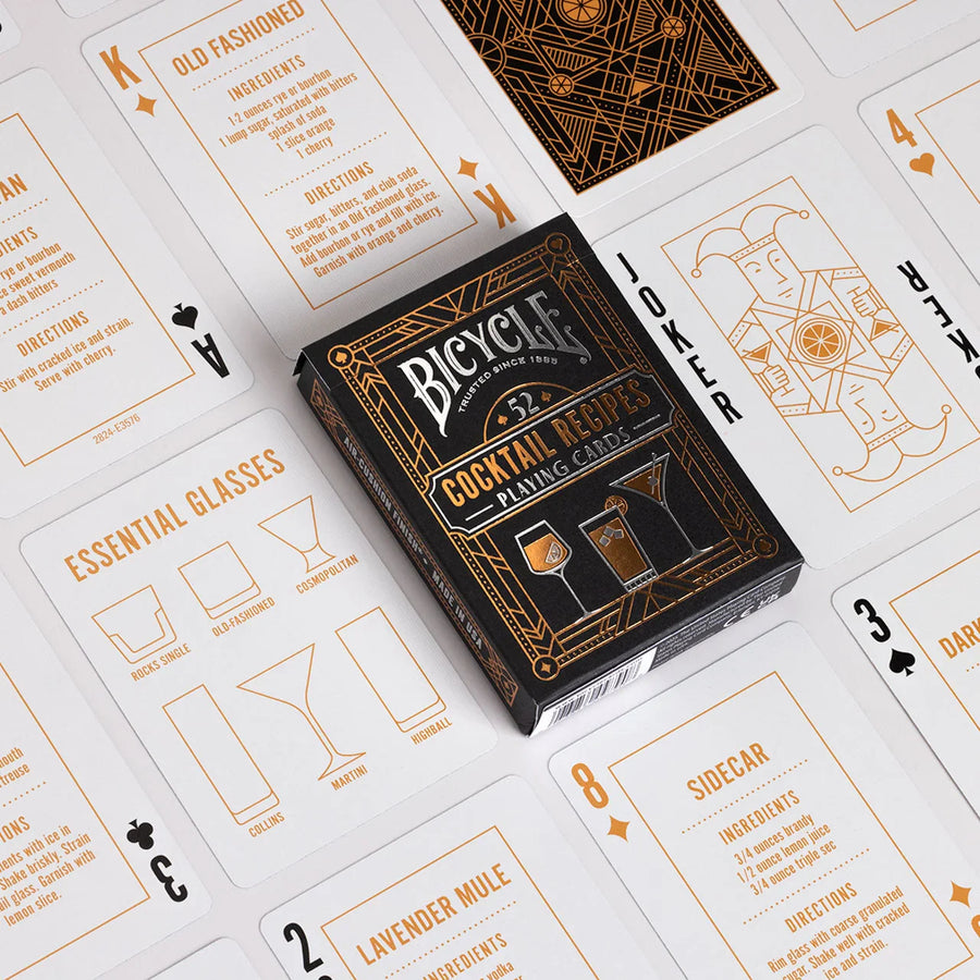 Cocktail Recipe deck surrounded by recipe-bearing card faces