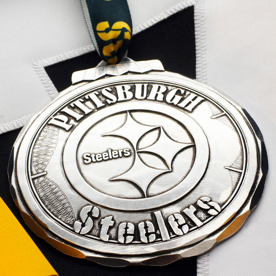 Styled display featuring Pittsburgh Steelers Classic Round Ornament