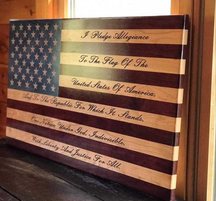 Angled view of the engraved Pledge of Allegiance wooden wall flag