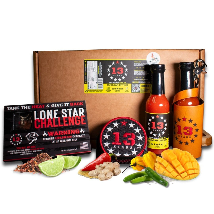 The Works gift assortment photo showing hot sauce, Lone Star chocolate and accessories