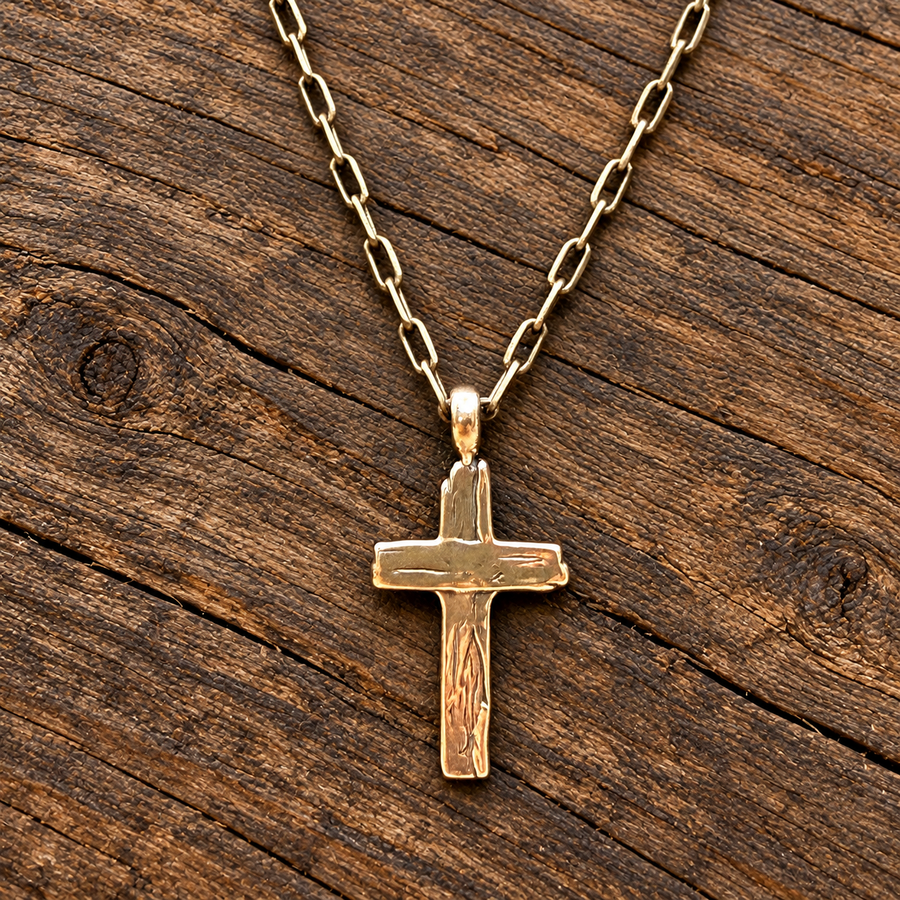 Weathered Cross pendant hanging from cable chain