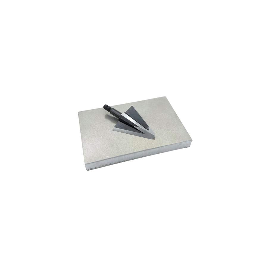 Angled view of a compact diamond stone and broadhead