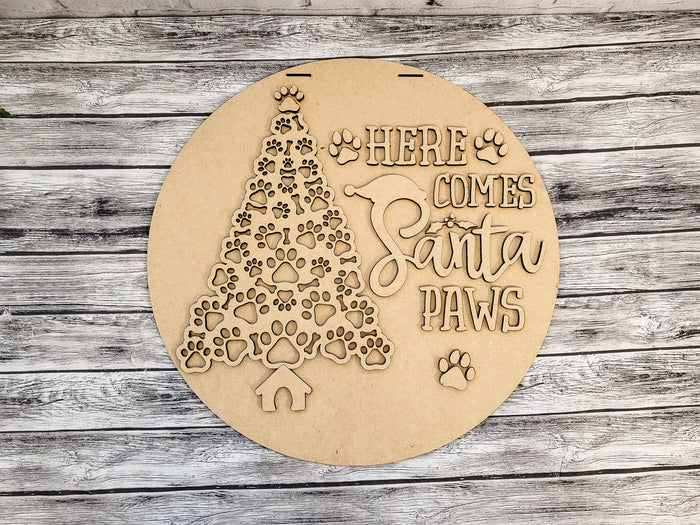 Unfinished Here Comes Santa Paws round sign with paw-pattern tree