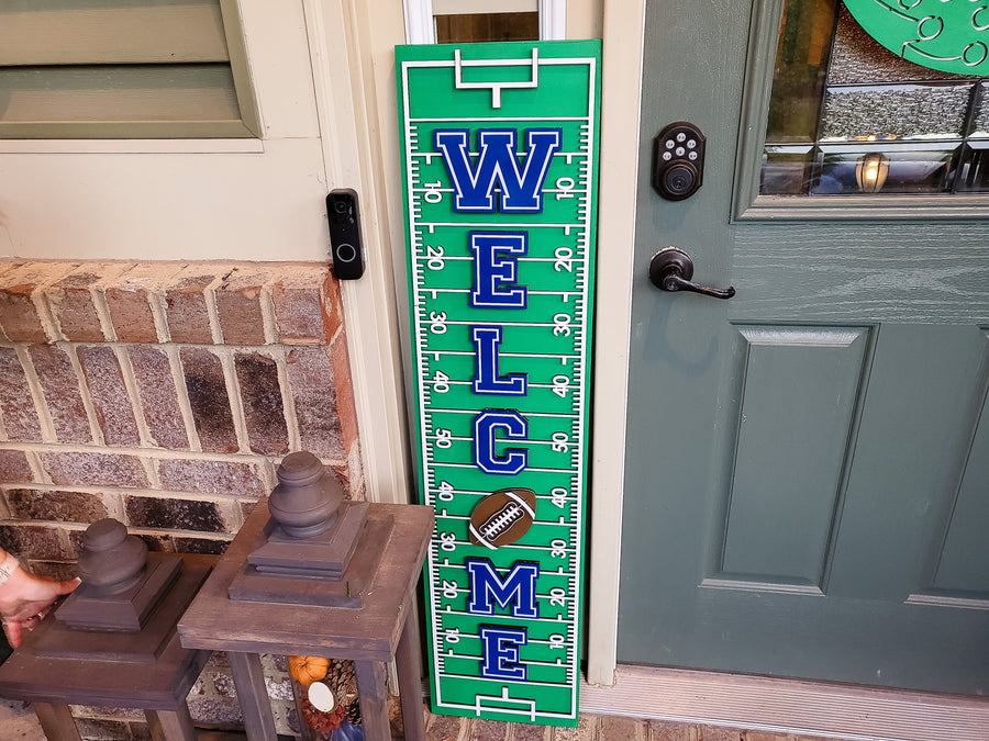 Finished-project example of a green football-field porch leaner by a doorway
