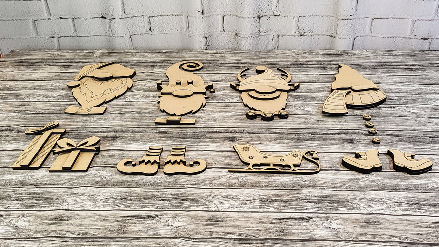 Separated MDF gnome bodies and accessory pieces