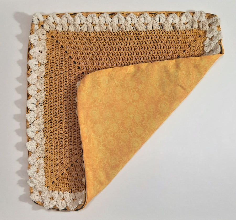 Golden Yellow Crochet Pillow Cover, folded cover exposing fabric backing