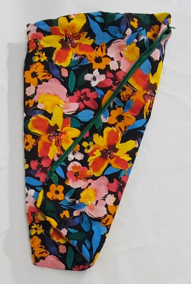 Bright Floral Travel Pillow Cover, close-up of the zippered opening