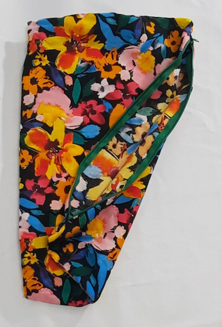 Bright Floral Travel Pillow Cover, folded cover showing the reverse