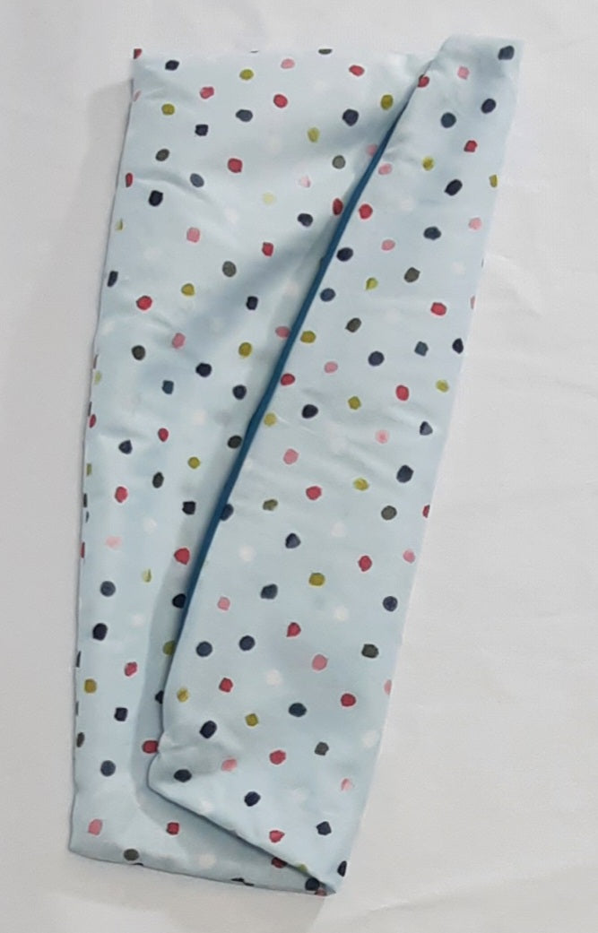 Multicolor Polka Dot Travel Pillow Cover, folded cover showing the reverse