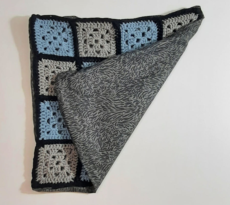 Blue & Grey Crochet Squares Pillow Cover, folded cover showing grey patterned reverse