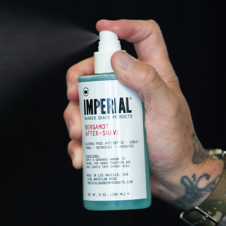 Alcohol-Free Bergamot Aftershave Spray — aftershave sprayer bottle held for application