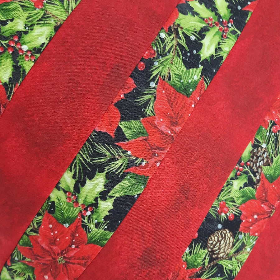 Red Stripe Poinsettia Pillow Cover, close-up of the fabric design