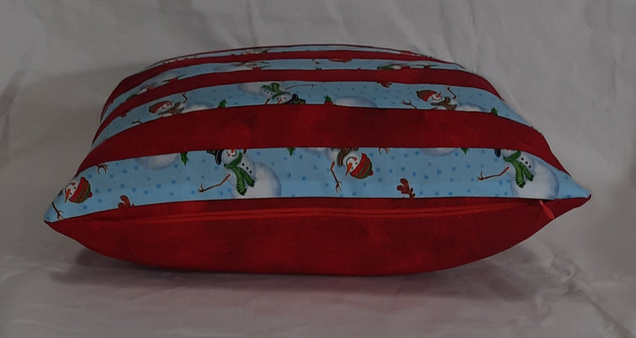 Snowman & Red Stripe Pillow Cover, side view of the filled cover