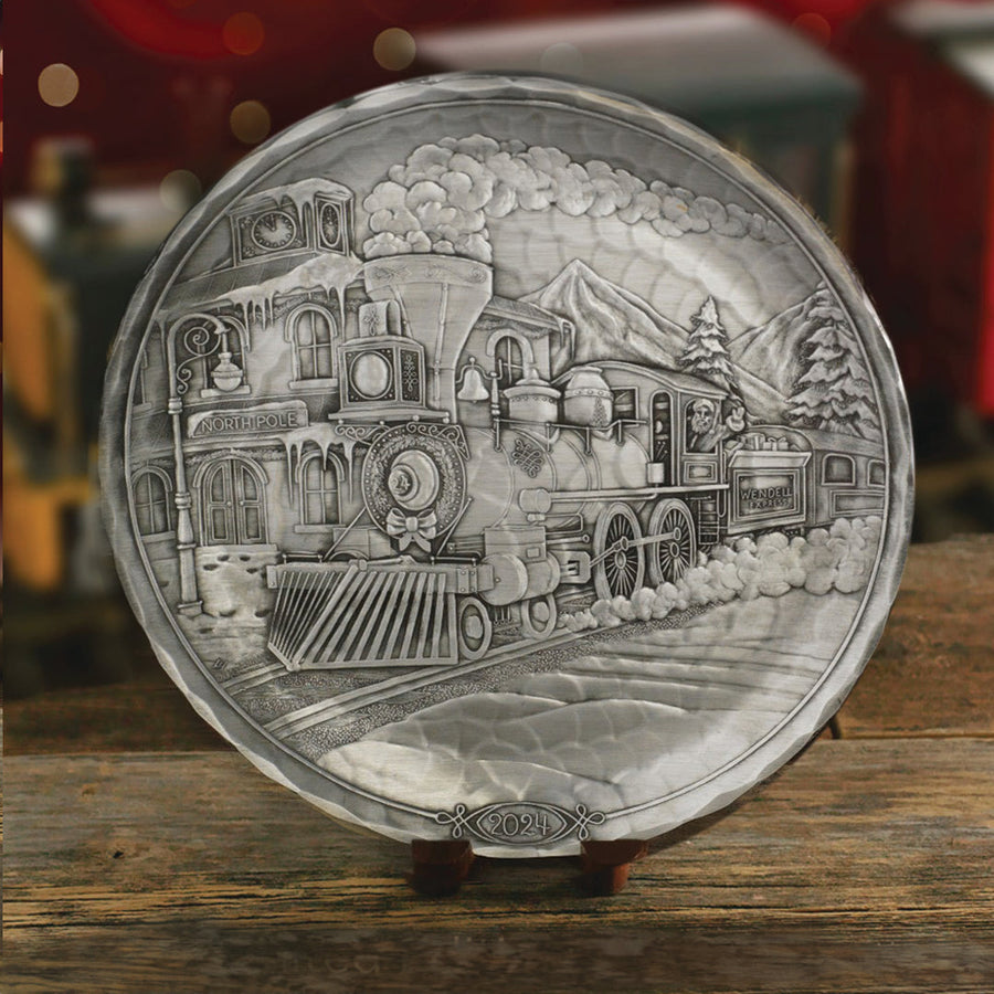 Styled display featuring 2024 Annual Plate- The Wendell Express