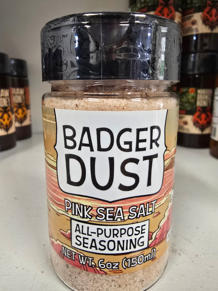 Badger Dust Pink Sea Salt seasoning bottle with black shaker lid