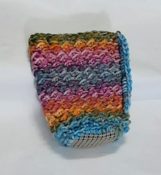 Rainbow Crochet Cup Cozy, angled view showing the underside and base