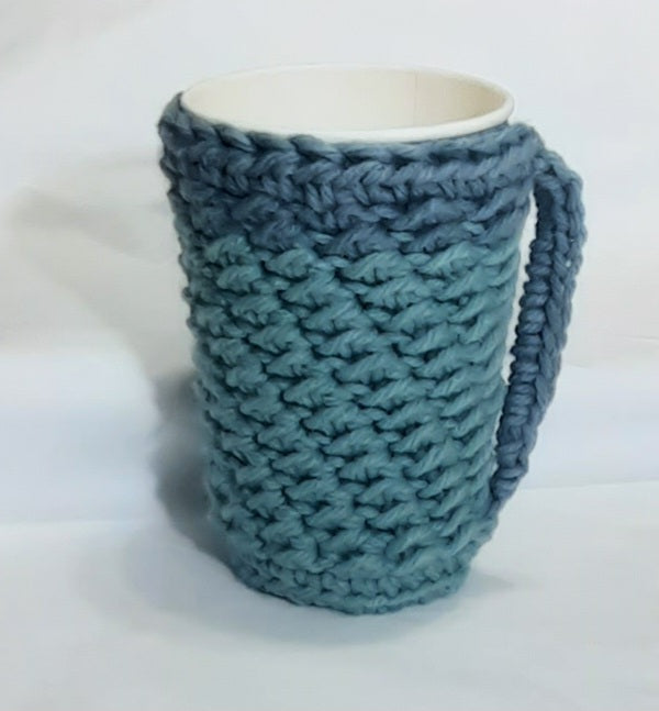 Green Crochet Cup Cozy, crocheted cozy around a display cup