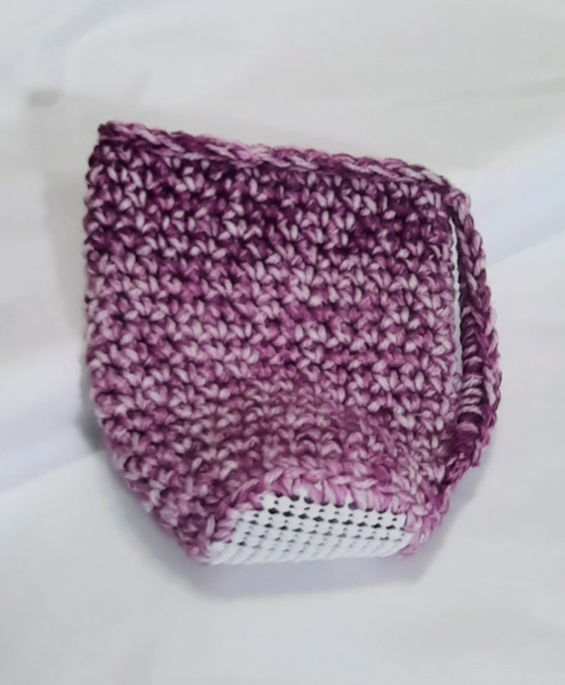 Purple Crochet Cup Cozy, angled view showing the underside and base