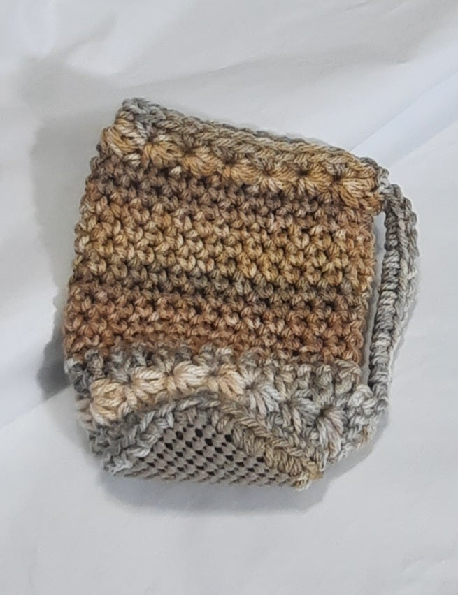 Brown & Grey Crochet Cup Cozy, angled view showing the underside and base