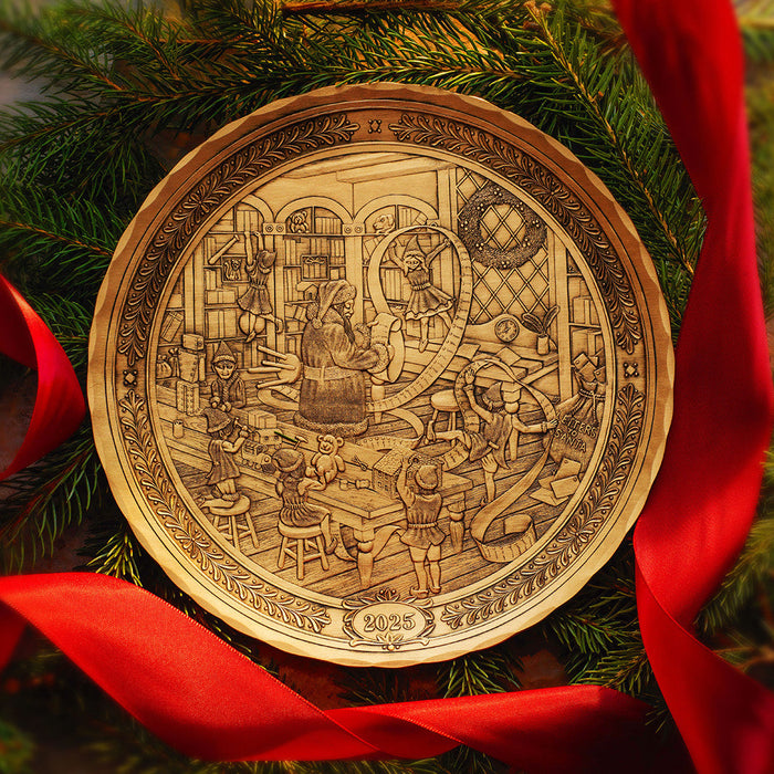 Styled display featuring 2025 Annual Plate- Santa's Workshop