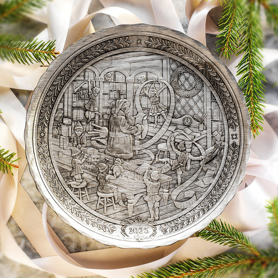 Styled display featuring 2025 Annual Plate- Santa's Workshop
