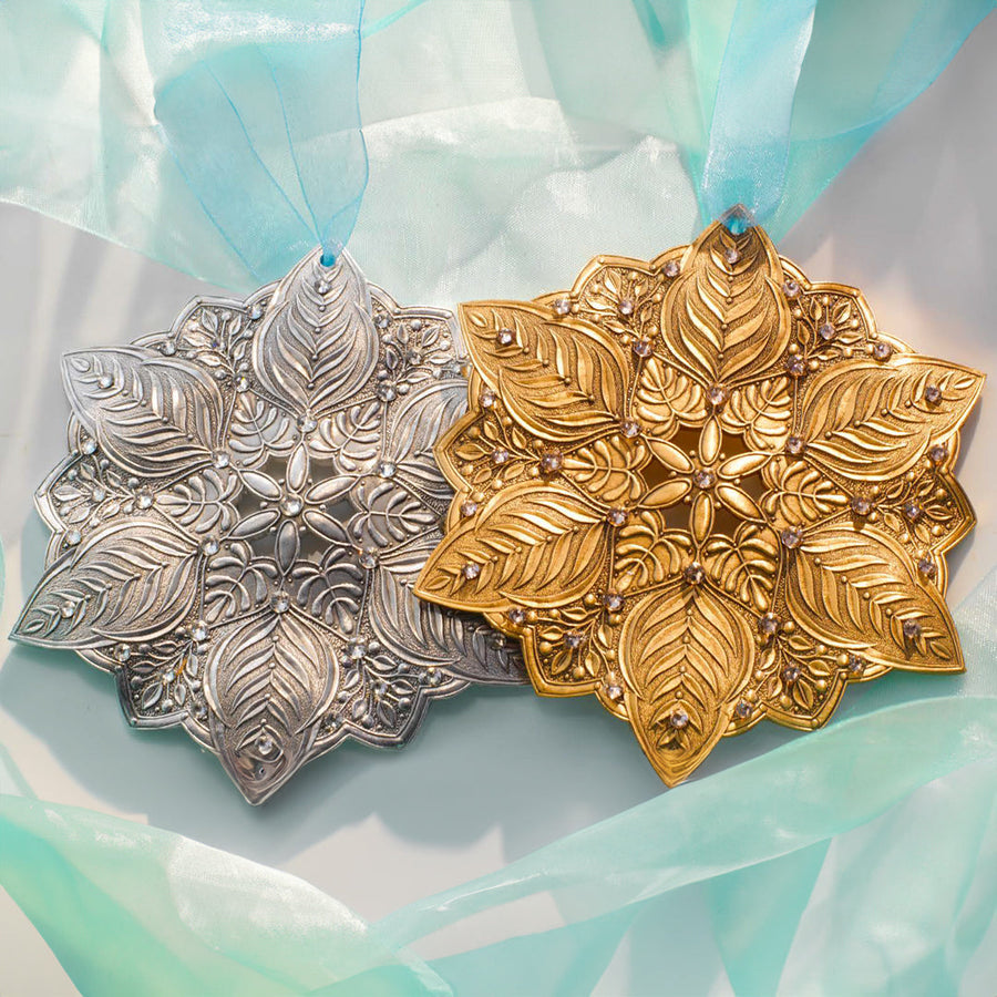 Collection display featuring Snow Crystal Winter Greens Ornament