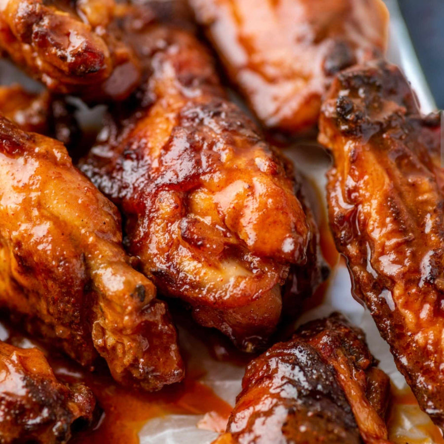 Glazed chicken wings illustrating a Garlic Reaper serving idea
