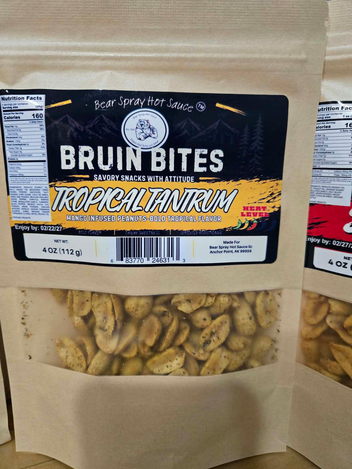 Tropical Tantrum mango-seasoned nut snack in a kraft pouch with a yellow Bruin Bites label