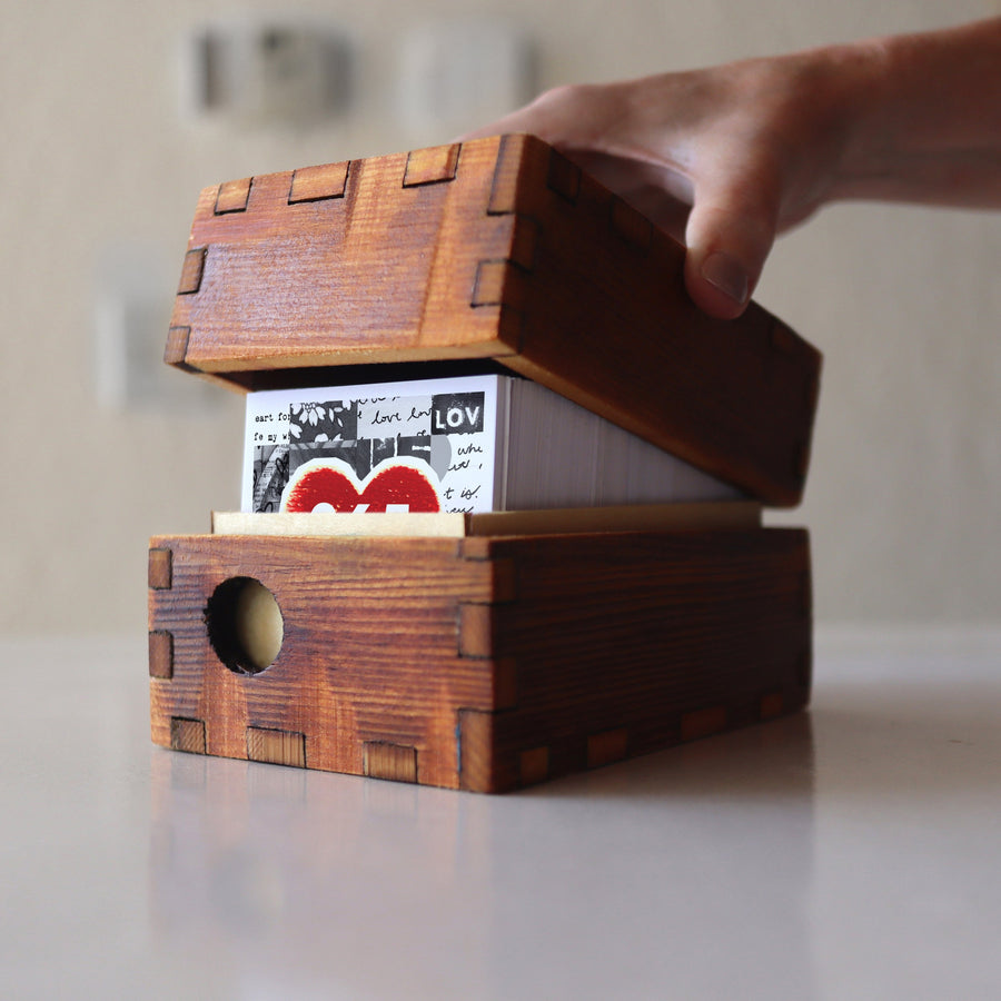 Optional wooden storage box holding a Heartwork card set.