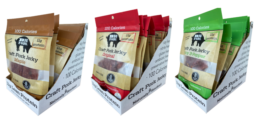 Three open display cases of Maple, Original and Spicy 3-Pepper pork jerky