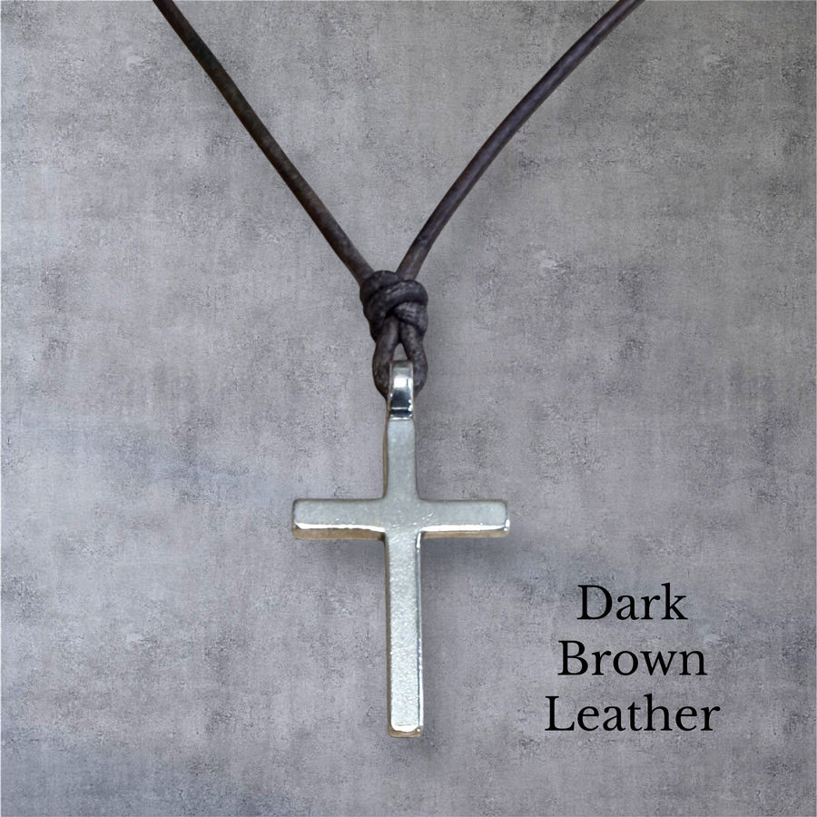 Classic cross on dark brown leather cord