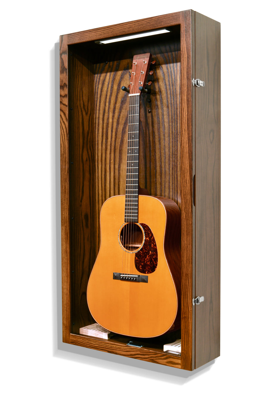 Rich Tobacco ash guitar humidor holding an acoustic guitar, side view
