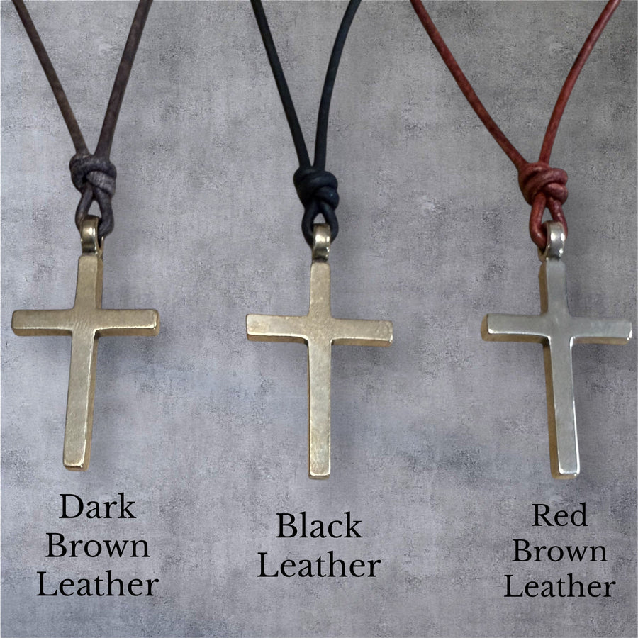 Classic Cross necklaces comparing dark brown, black and red brown cords