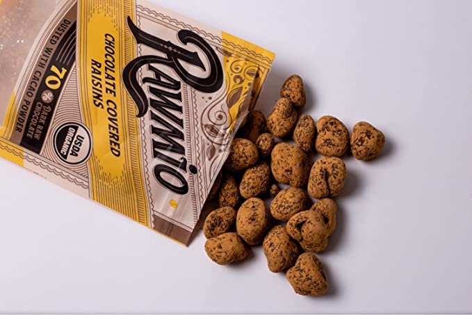 Chocolate-covered raisin bag beside loose coated raisins