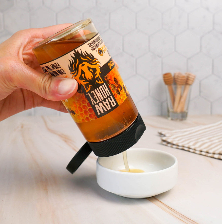 Raw Honey being poured into a small bowl