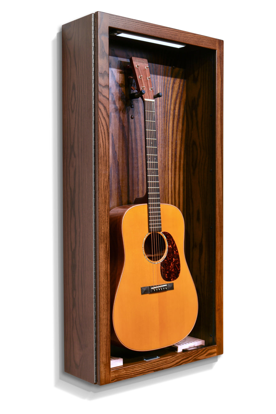 Rich Tobacco ash ClimaCase holding an acoustic guitar, angled view