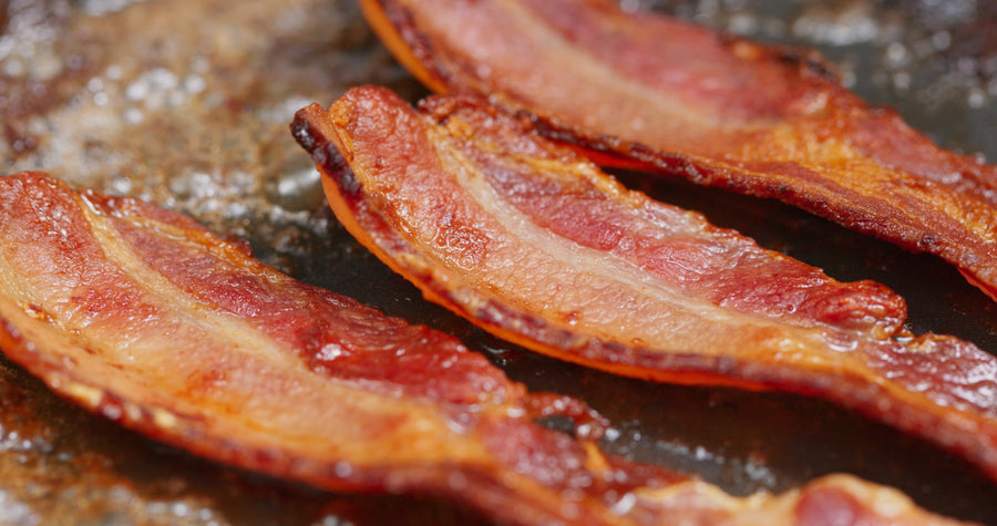 Cooked bacon strips illustrating the Hickory Bacon flavor