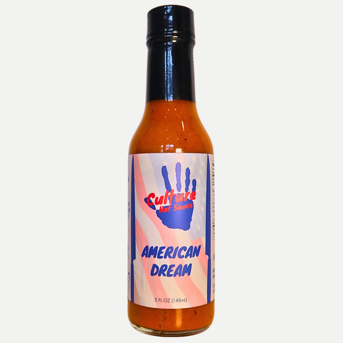 American Dream ranch and roasted corn hot sauce bottle with a black cap