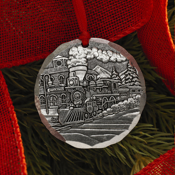 Styled display featuring 2024 The Wendell Express Annual Ornament