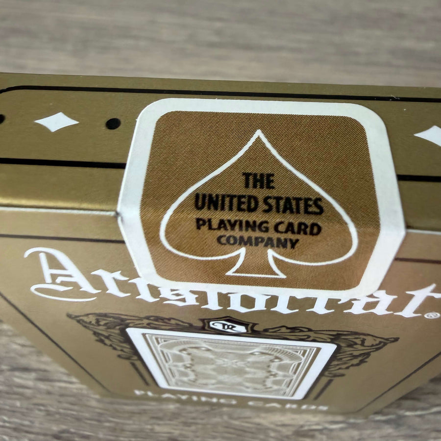 Gold Aristocrat tuck and anniversary-style seal