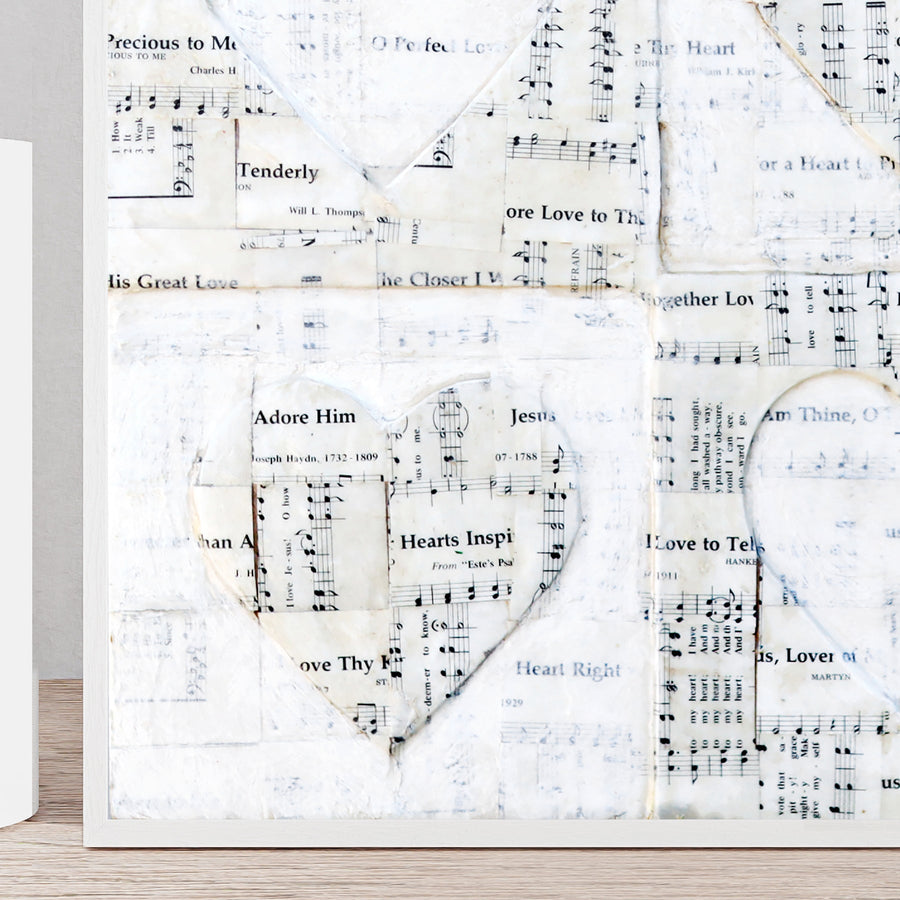 Love Hymns art print with four hearts and vintage sheet-music imagery.
