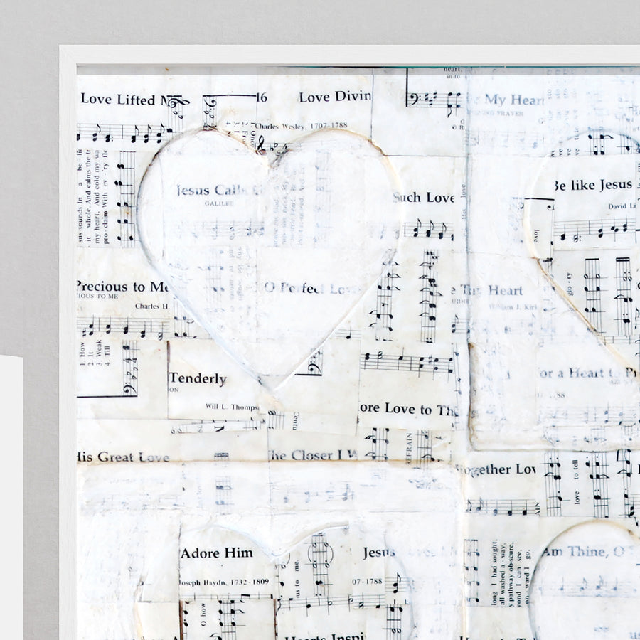 Love Hymns art print with four hearts and vintage sheet-music imagery.