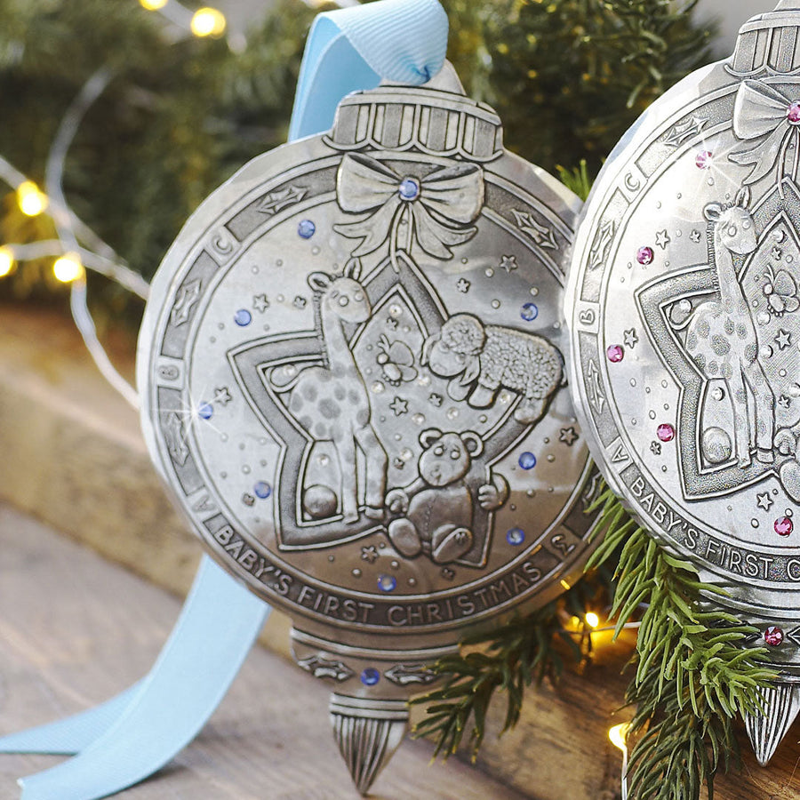 Styled display featuring Baby Boy's First Christmas Ornament with Crystals