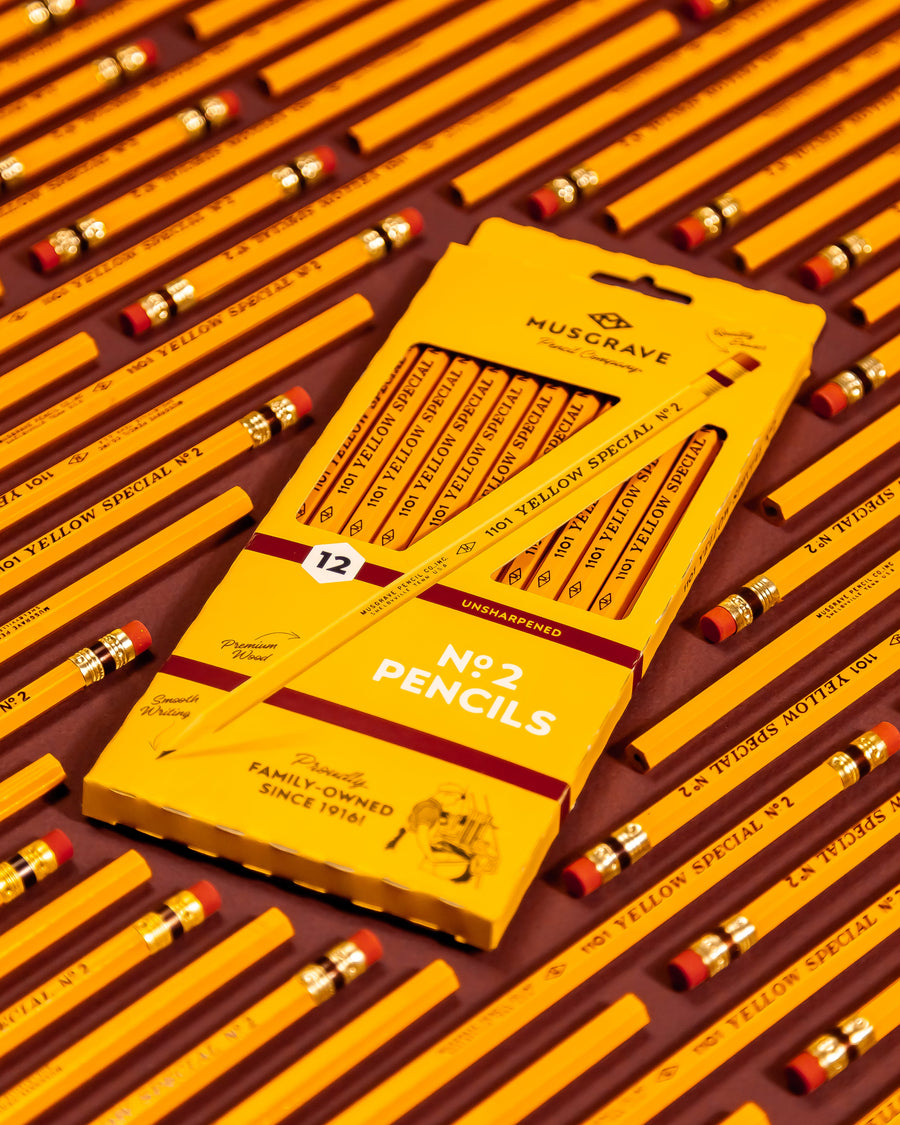 Twelve-count Yellow Special box surrounded by yellow pencils